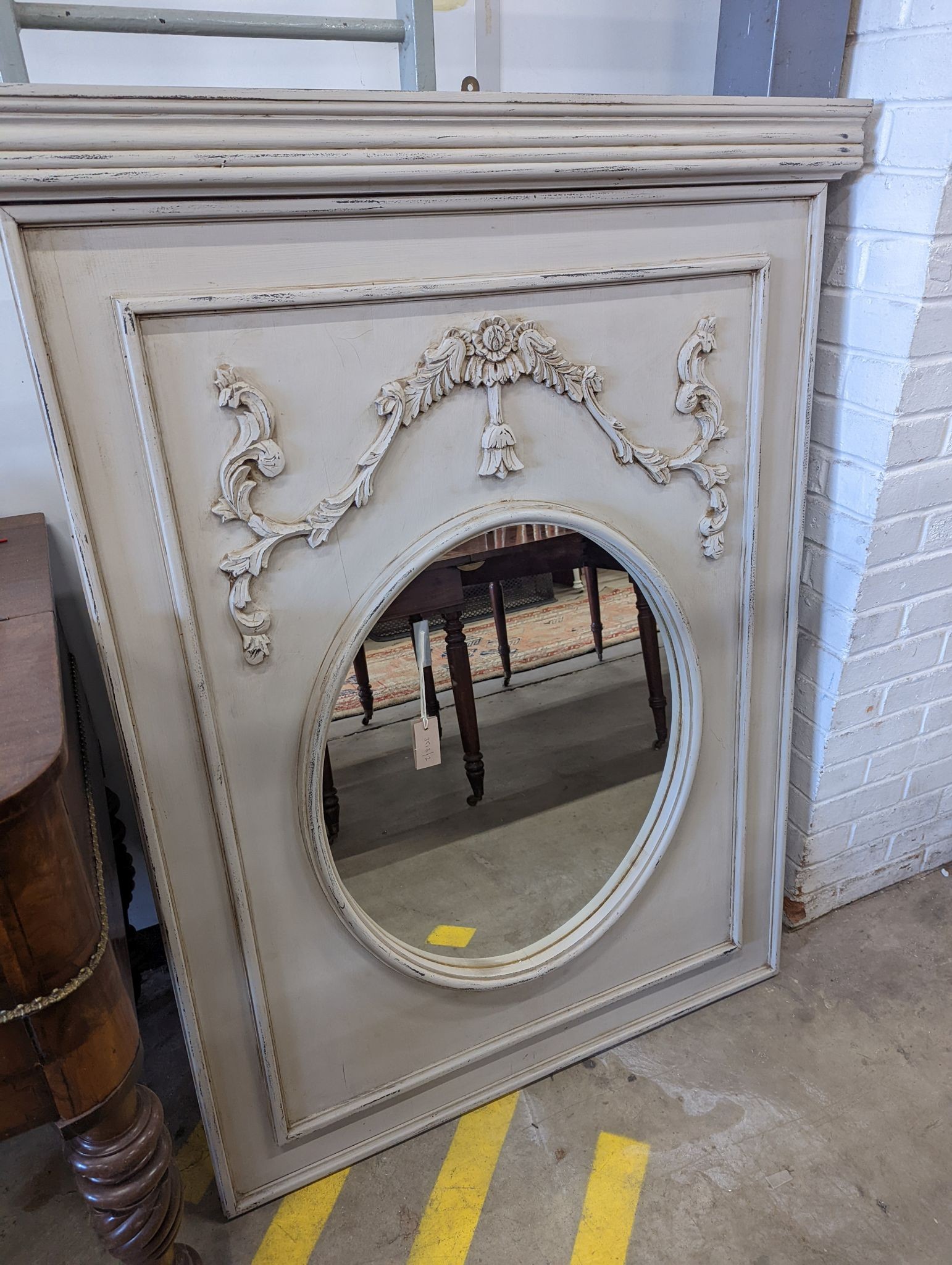 An 18th century style painted overmantel mirror with oval plate, width 108cm, height 140cm
